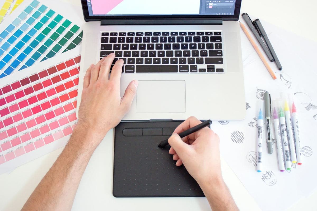 A designer choosing colours for a print job